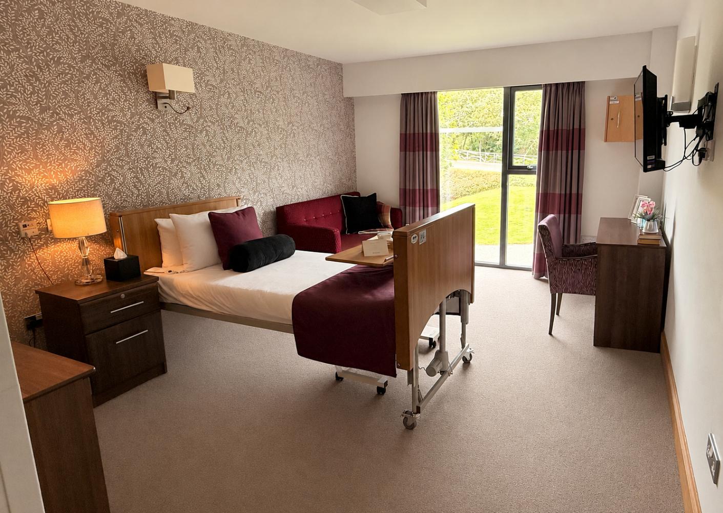 modern care home bedroom with large windows