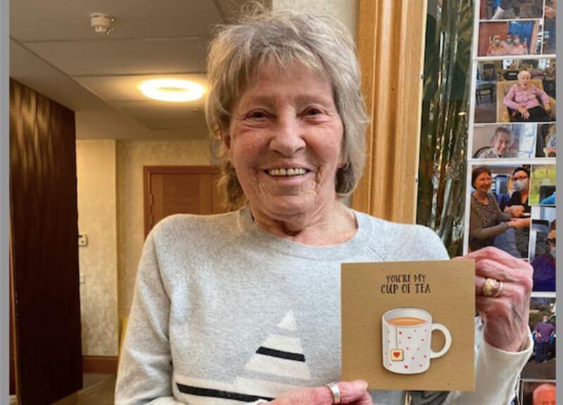 Resident Holding Valentines Card