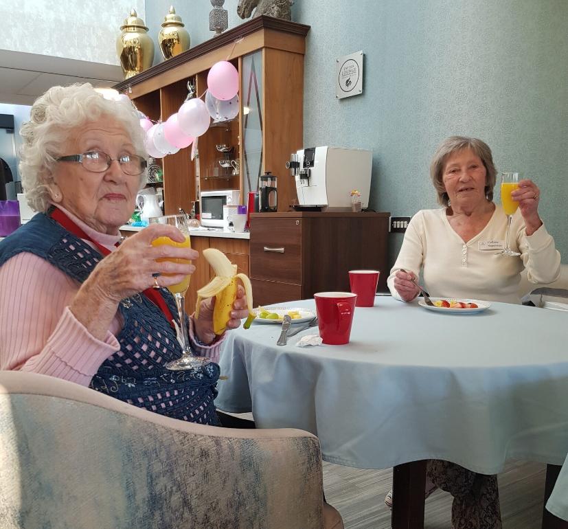 residents-enjoying-drinks-and-a-snack