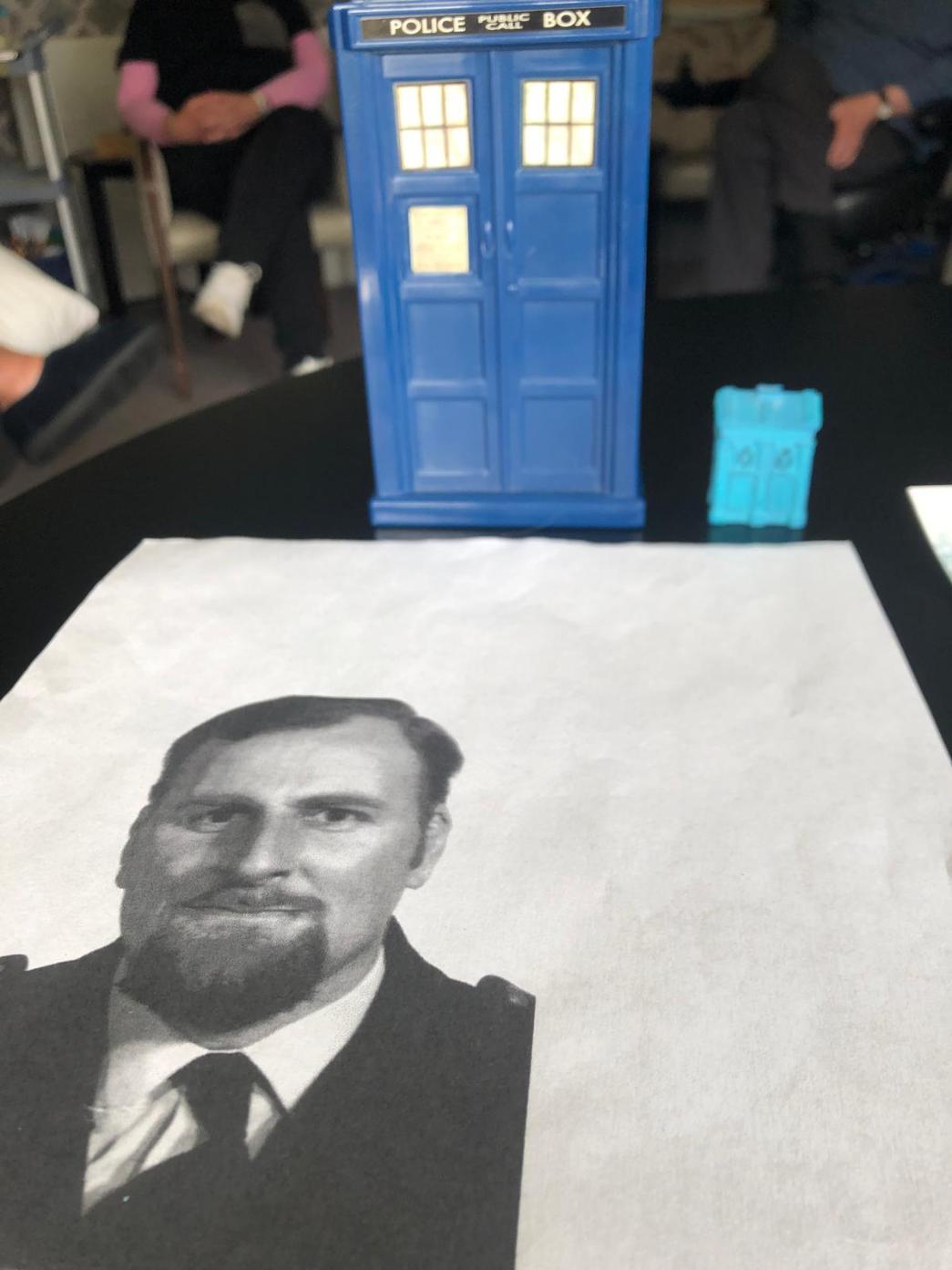 Residents at Manor Grange Care Home looking at a blue police box