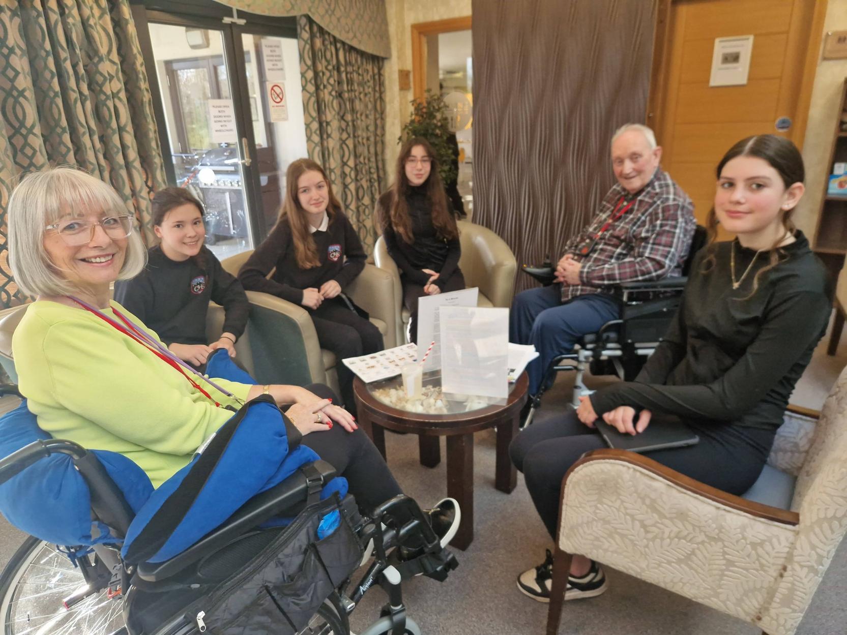 Children smiling with residents