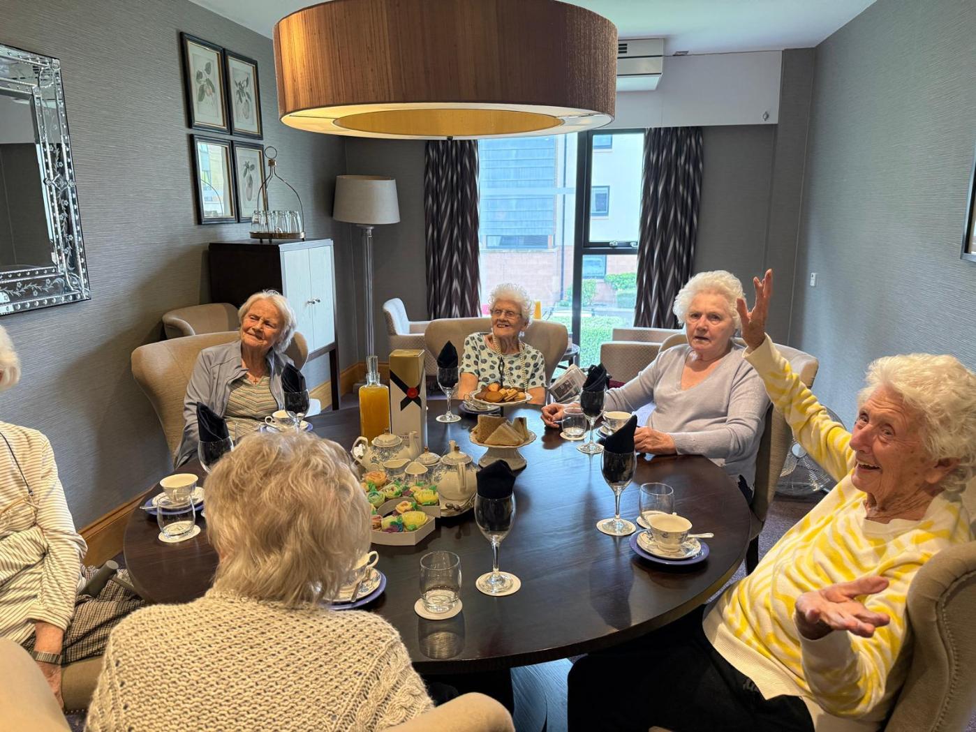 elderly woman in manor grange tea room